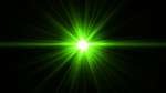 A flare from a green laser pointing at the camera